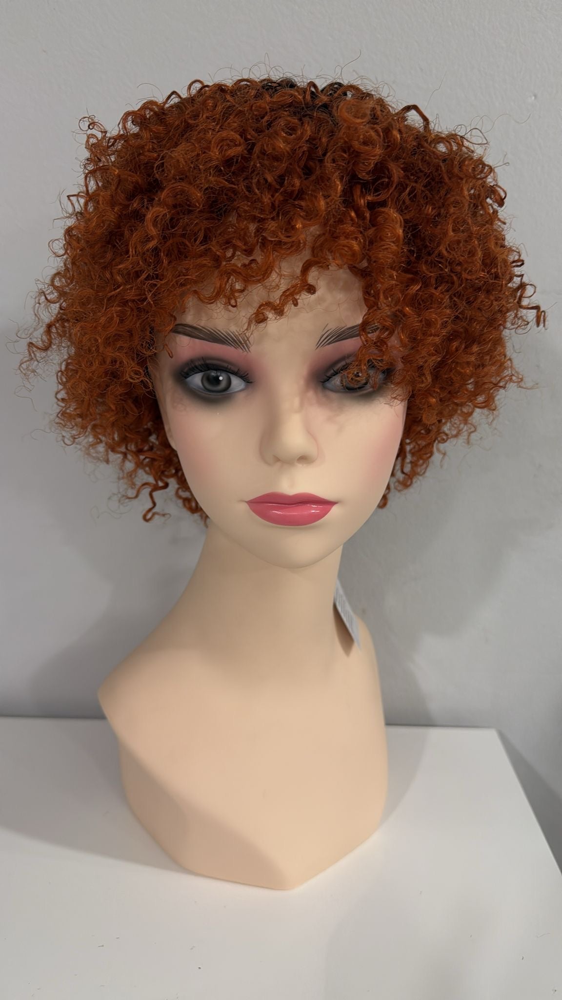 Short Copper Curly Wig – Bold & Fun Look

Standard fit (adjustable)